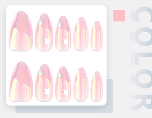Detailed view of pink holographic almond press-on nails with white star patterns