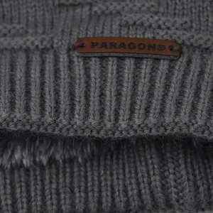 Winter thermal knit beanie for men featuring warm fleece lining and leather brand patch