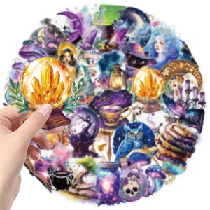 Close-up of waterproof magic planet stickers showing a crystal ball and mystic elements