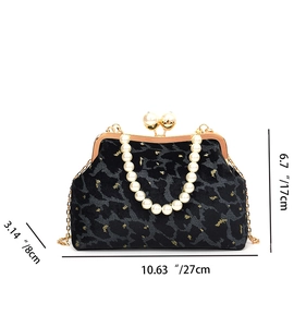 Velvet shell bag with pearl handle and metal chain showing dimensions 27x17x8cm
