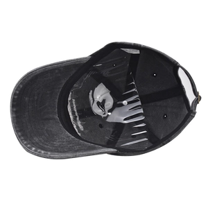 Detailed interior of black washed cotton baseball cap with sweatband and metal buckle