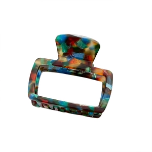 Minimalist square acetate hair claw clip with colorful floral pattern on white background