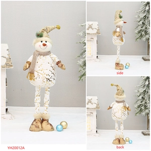 Front side and back views of gold fabric snowman figurine with leaf embroidery