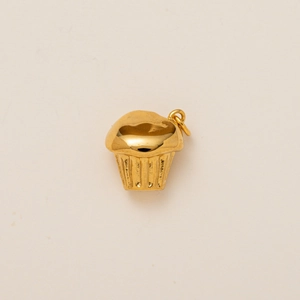 Detail of 18K gold-plated stainless steel mushroom pendant with textured finish