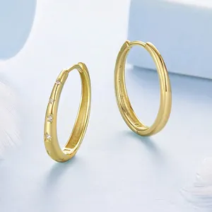 Elegant 925 sterling silver star hoop earrings with gold plating and cubic zirconia stones