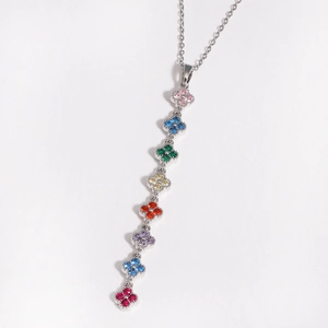 Detailed view of luxury stainless steel necklace featuring colorful zircon clover pendants