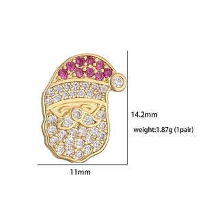 Detailed view of Santa Claus stud earrings showing dimensions 14.2mm by 11mm and weight
