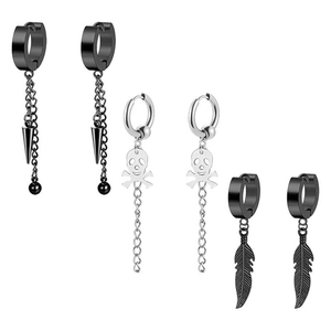 Detail view of black punk earring set featuring skull, feather, and cone pendants in steel