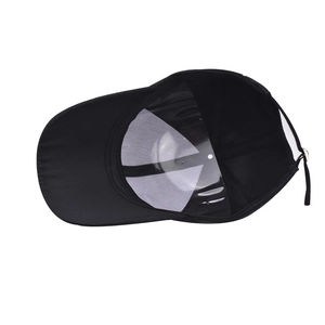 Detail view of cotton baseball cap with adjustable metal buckle and inner sweatband
