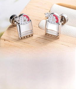 Detail of pink enamel stud earring with 0.8x6mm titanium steel bar and zircon stones