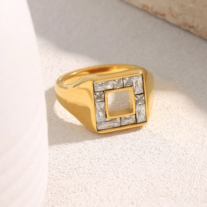 Detailed macro view of 18K gold plated square hollow ring with geometric zircon settings