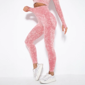 Detail of high-stretch acid wash seamless yoga leggings showing elasticity and texture