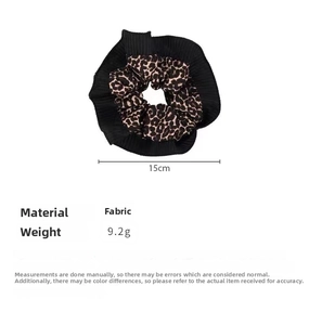 Detailed view of 15cm double-layer leopard print and black fabric scrunchie specs