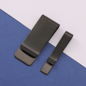 Detail view of two matte black brushed metal money clips in wide and narrow sizes