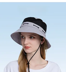 Detail of breathable grey mesh fisherman hat with adjustable windproof drawstring for hiking