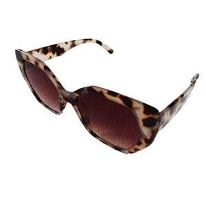 Retro tortoiseshell cat-eye sunglasses with brown gradient lenses on a white background