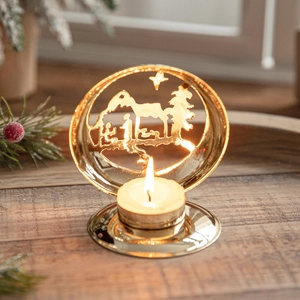 Golden metal Nativity scene candle holder with Bethlehem star and Christmas silhouettes