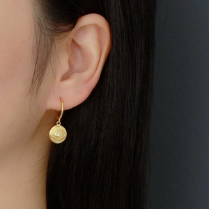 S925 Sterling silver hoop earrings with evil eye charm and gold finish for women