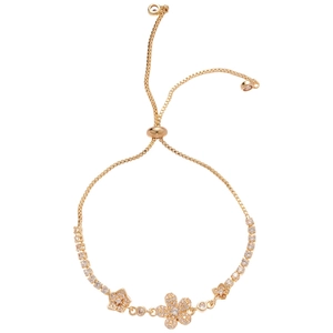 Adjustable golden flower bracelet with sparkling zircons in a minimalist bolo design