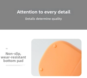 Detail of the non-slip round foot pads on the bottom of the orange plastic pen holder