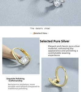 Detailed close-up of 925 sterling silver earrings with round zircon and polished finish