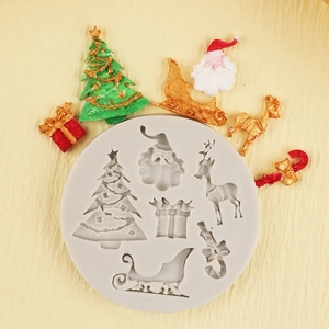 6-Fach Silikonform mit Weihnachtsmann, Rentier und Baum für Schokolade und Backen