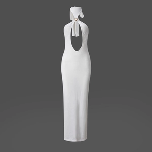 Detail of white halter neck dress featuring chest cutout and metal ring decoration