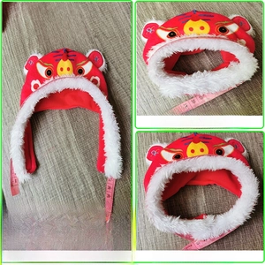 Detailed size chart for red tiger pet hat with plush texture and adjustable strap