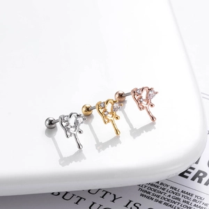 Three steel heart-shaped cartilage studs with zircons in silver gold and rose gold