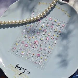 Aurora silver mermaid nail stickers with sea shell and jellyfish designs in a tray