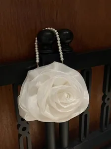 Elegant white camellia fabric handbag with pearl handle for bridal banquet and evening use