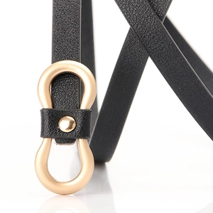 Minimalist black PU leather thin belt for women featuring a gold figure-8 metal buckle