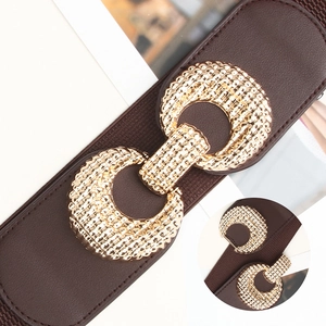 Brown elastic corset belt with a large textured golden metal buckle for women's dresses