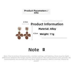 Detailed view of brown enamel flower earrings with dimensions and material specs