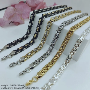 6mm stainless steel Byzantine chain necklaces in gold silver and black tones displayed on stand