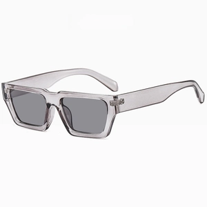 Detail view of transparent grey rectangle sunglasses with thick frame and wide temples