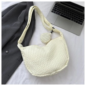 Detail of off-white bubble texture tote bag with a small matching round coin purse pouch