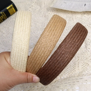 Three wide braided cotton linen headbands in beige and brown with handmade texture