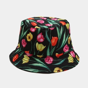 Detail of black reversible bucket hat with colorful tulip print and canvas texture