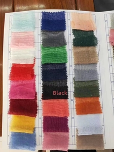 Detailed color swatches of crinkled linen scarves with numeric index for easy selection