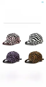 Detail view of four zebra print baseball cap colors in twill cotton fabric