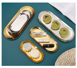 Detailed comparison of gold and silver stainless steel oval trays in various sizes