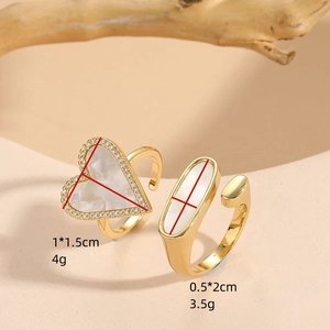 Golden open ring set with heart mother of pearl and zircon stones on elegant stand