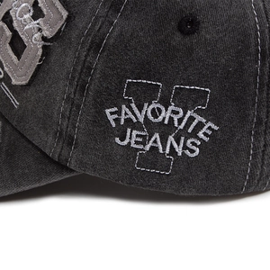 Vintage washed cotton baseball cap with retro 1985 embroidery and distressed texture