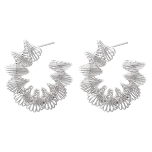 Detailed view of silver C-shaped hoop earrings with a twisted spiral thread design