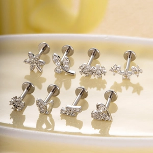 Set of 8 silver stainless steel labret studs with zircon stars and butterfly designs