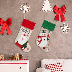 Classic linen Christmas stockings with Santa and Snowman patterns for festive home decor
