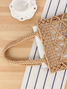 Minimalist beige cotton rope woven hollow tote bag for beach vacation and casual travel