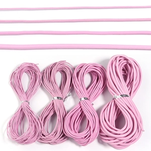 Detail showing four sizes of pink leather cords for DIY jewelry making and crafts