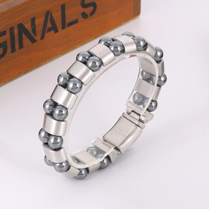 Detail of 316L stainless steel clasp and grey hematite beads on men's bracelet